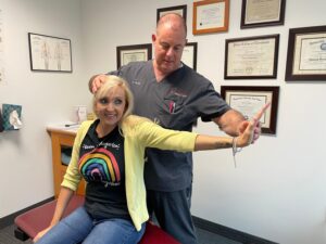Dr. Packer orthopedic exam Dr. David Packer performing a back pain examination on a patient at Precision Spinal Care in Chesapeake VA